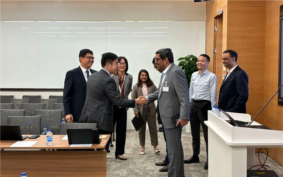 Delegates meeting and shaking hands in a conference room
