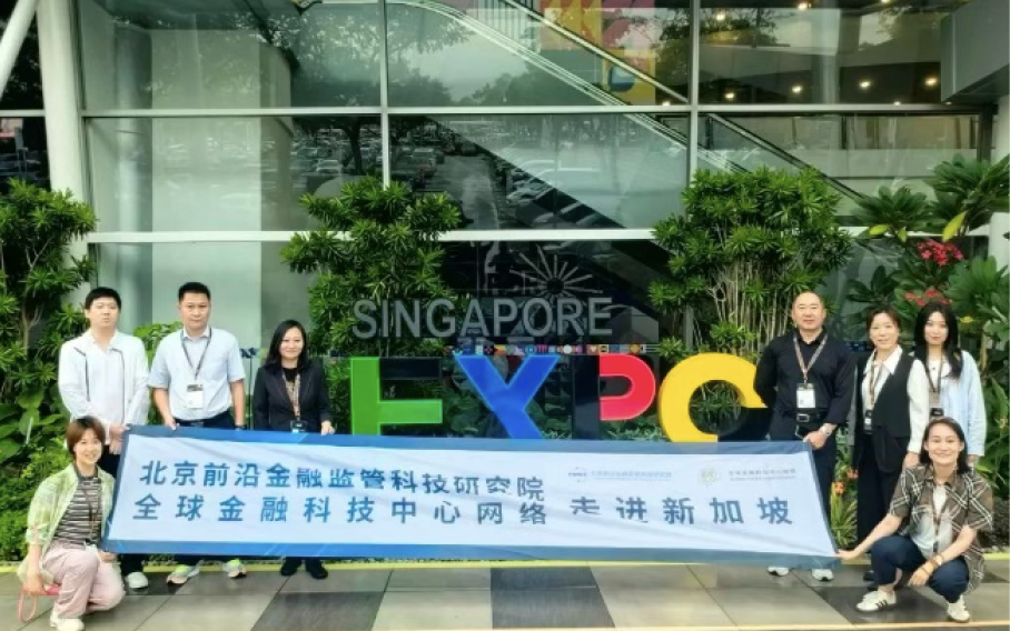 Delegation group posing together at Singapore Expo