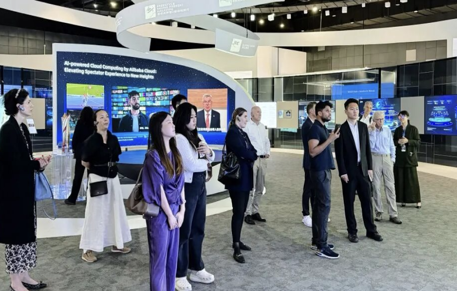 Delegates exploring a technology showcase